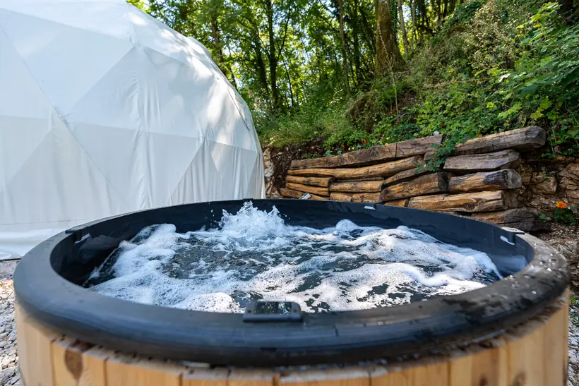 Geodesic glamping dome with private jacuzzi at Zen Relaxing Village