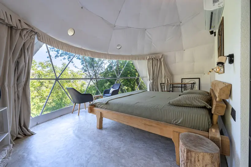 Geodesic glamping dome with private jacuzzi at Zen Relaxing Village