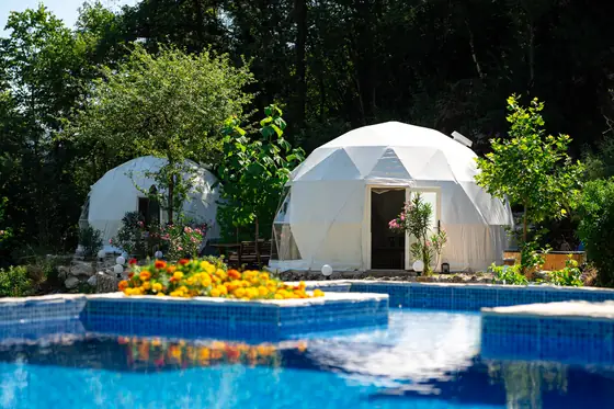 Pool, gardens and mountain views at Zen Relaxing Village glamping resort, Montenegro