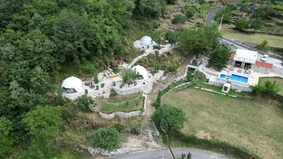Pool, gardens and mountain views at Zen Relaxing Village glamping resort, Montenegro